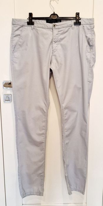 Spodnie męskie jasno niebieskie materiałowe Reservd 36/36 36 XXL błęki