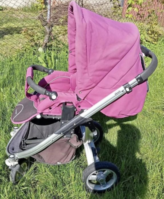 Wózek Dziecięcy 4Runner w Kolorze Fuksji z Gondolą i Wkładką Kwiatową