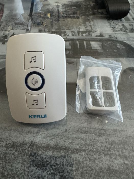 Kerui дверний дзвінок та пульт від сигналізації