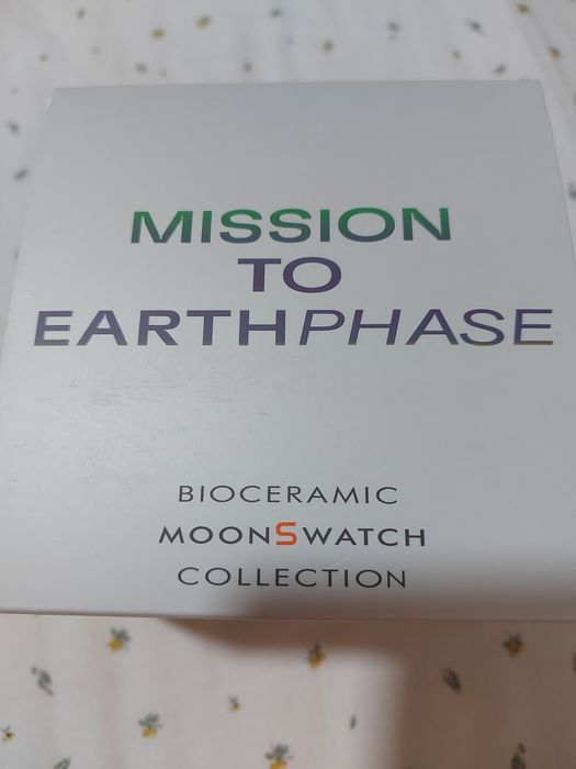 Swatch omega Earthphase