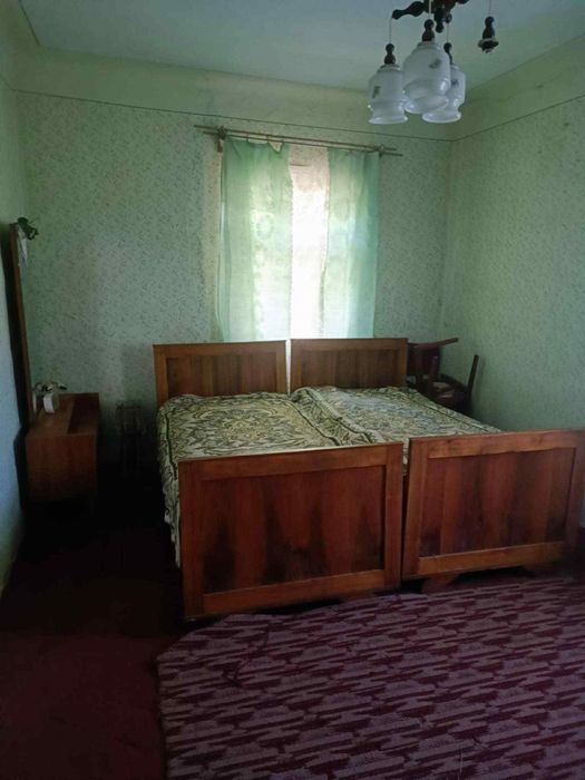 Продам дерев'яний будинок у с. Попелі.