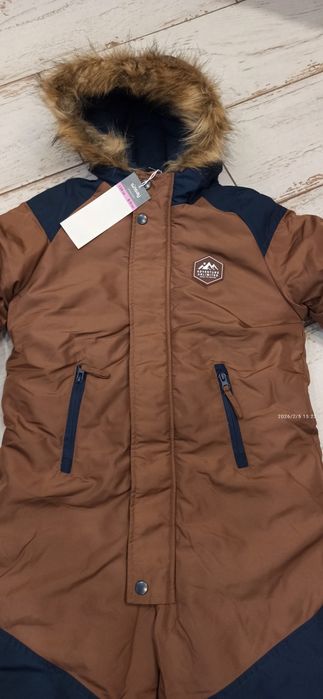 Nowy zimowy kombinezon dla chłopca 128/134