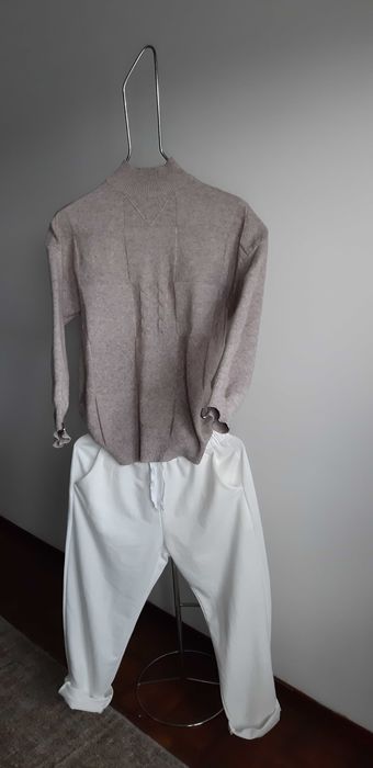 Expositores de roupa.