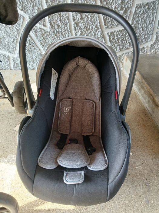 Vendo conjunto de carrinho e cadeira auto como novo