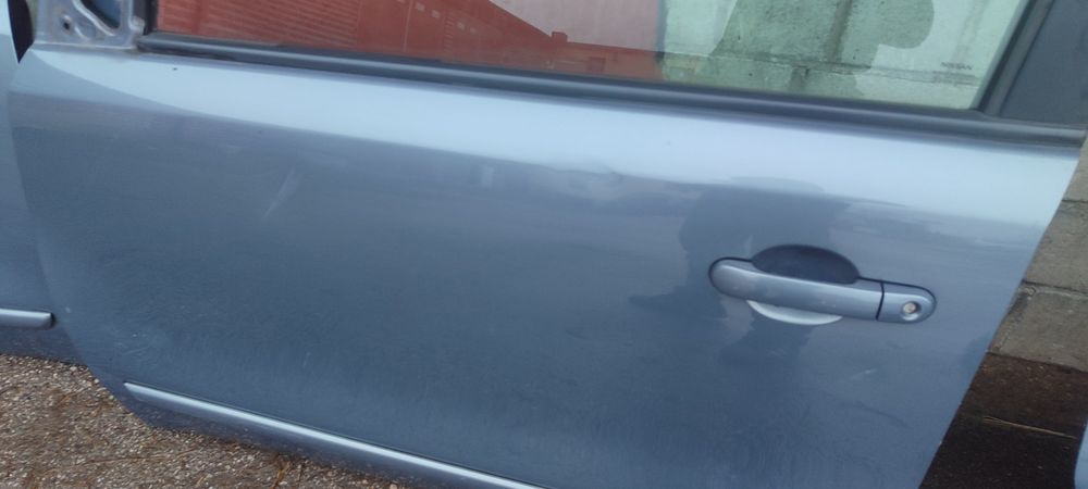 Nissan Note E11 drzwi lewe prawe przód lub tył B52G