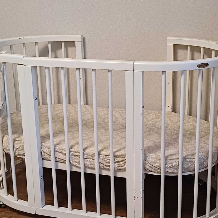 Дитяче ліжечко овальне