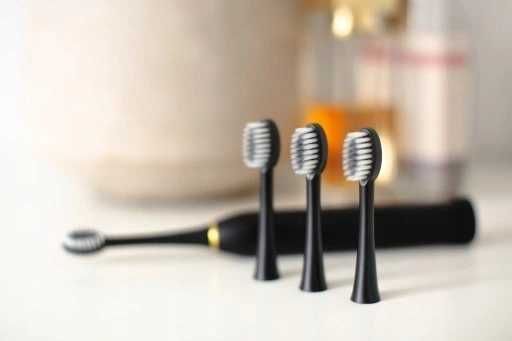 ZESTAW Szczoteczka soniczna 3 końcówki ładowarka biała czarna różowa