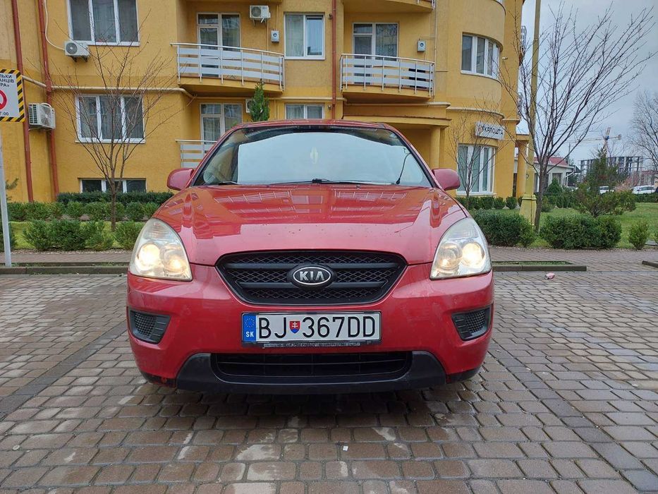 Kia Carens 2008 капот фара