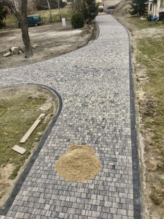 Brukarstwo Brukarz Układanie kostki brukowej