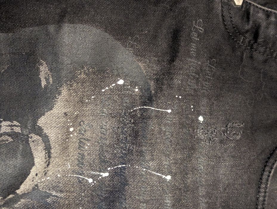 jeansy Philipp Plein, denim z nadrukiem i przetarciami