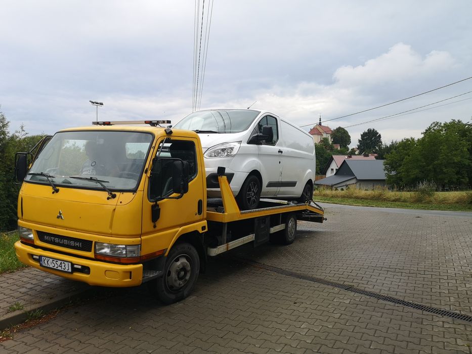 Transport Maszyn budowlanych Laweta Kraków i okolice