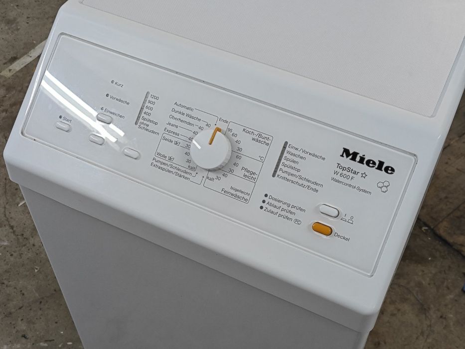 Вертикальна пральна машина Miele TopStar