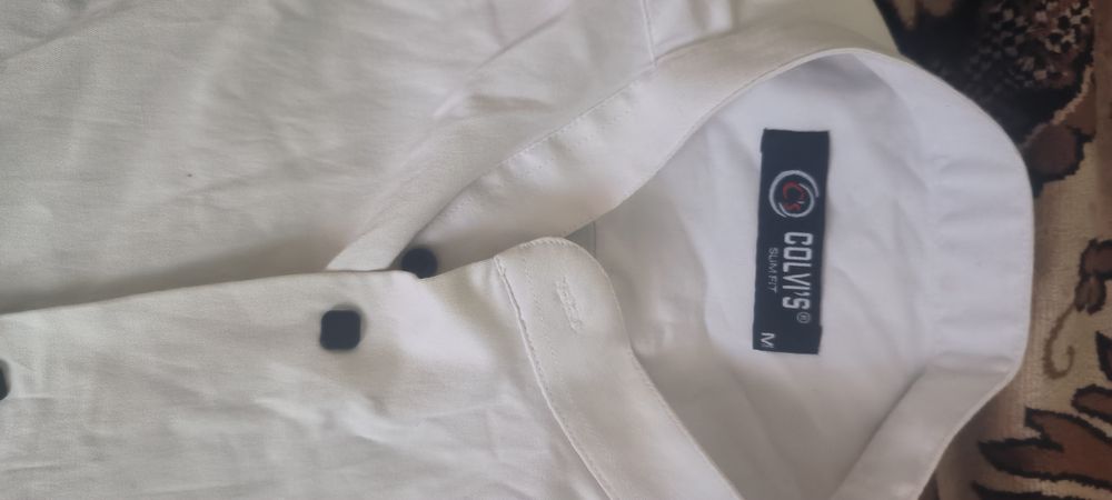 Рубашка на закльопках без коміра