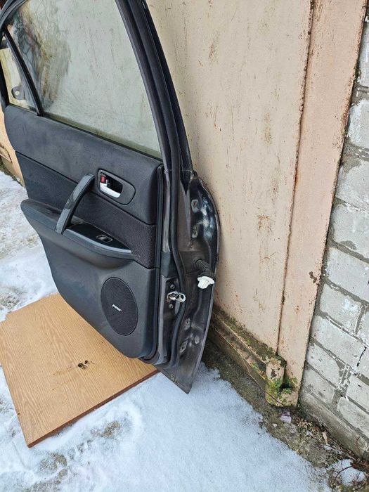 Mazda 6  хечбек дверь левая задняя