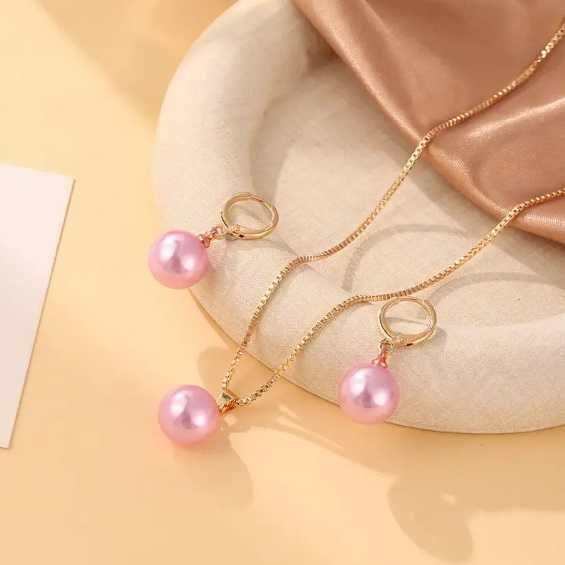 Прикраси з рожевою перлиною
