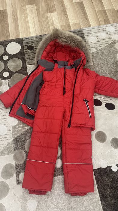 Комбінезон з натуральним мехом енота