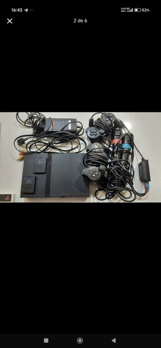 PlayStation 2 com jogos comandos e micros tudo em bom estado