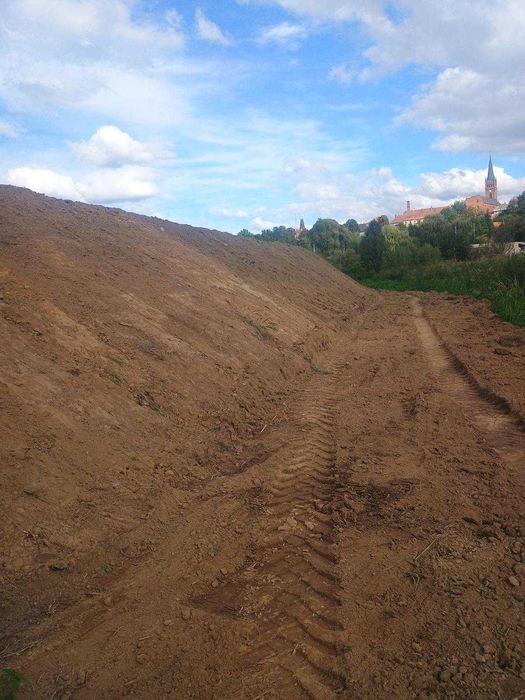 Usługi koparko ładowarką mecalac 12