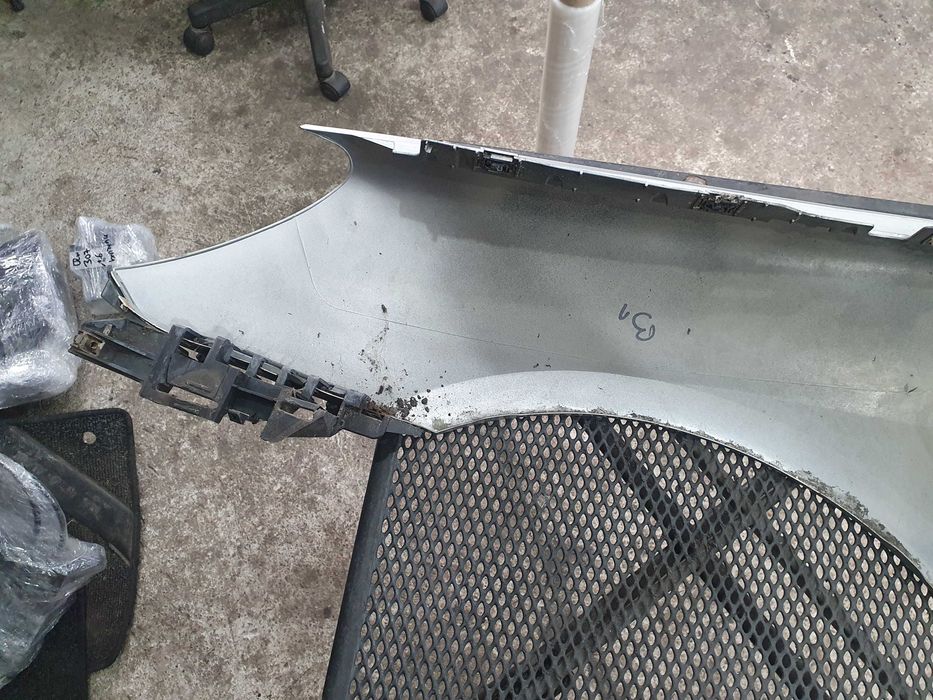 Blotnik prawy Peugeot 307 EZRC