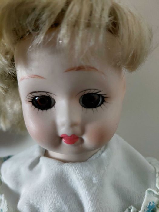 Boneca de porcelana64584497309569121