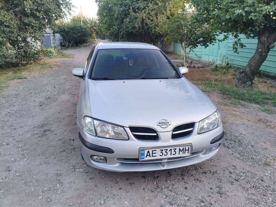 Nissan Almera 1.5 ГАЗ/бензин (2001) • 329 тыс. км • Седан