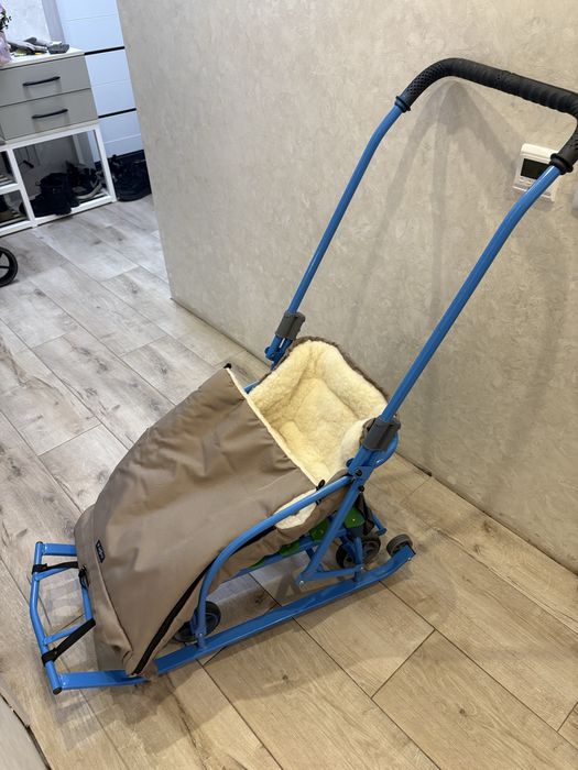 Дитячі санки на колесах