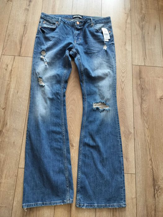 Dzwony spodnie damskie L miękki elastyczny jeans Rebel Denim pas92