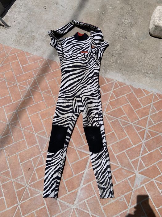Fato de surf, roupa de borracha