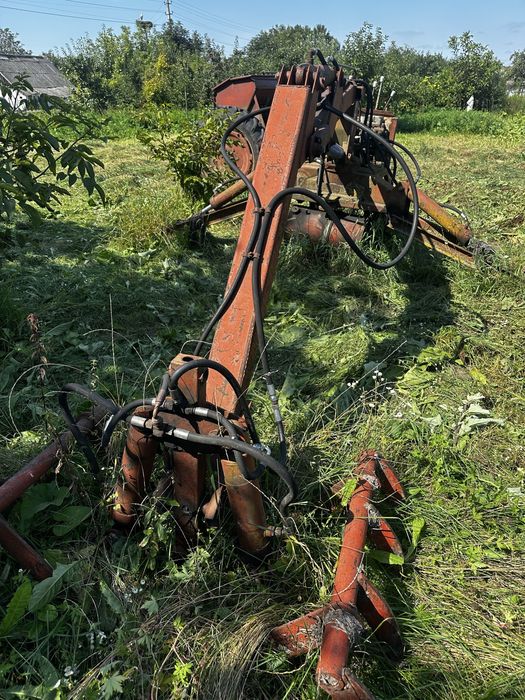 Грейферний навантажувач