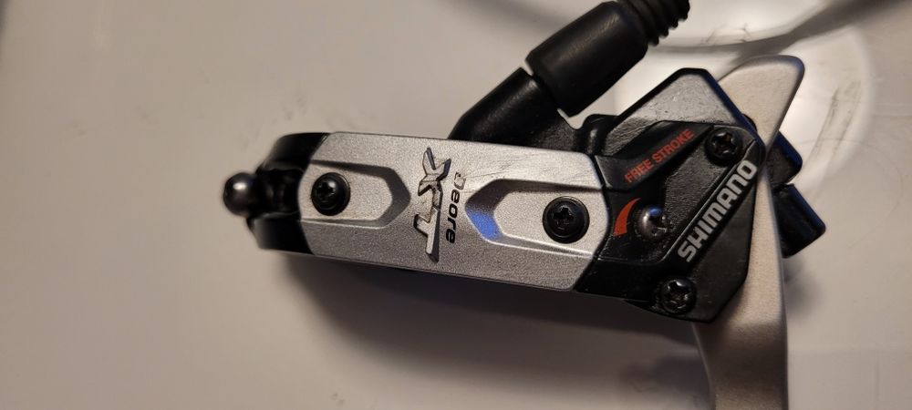 Hamule hydrauliczny SHIMANO Deore XT / Hone tył