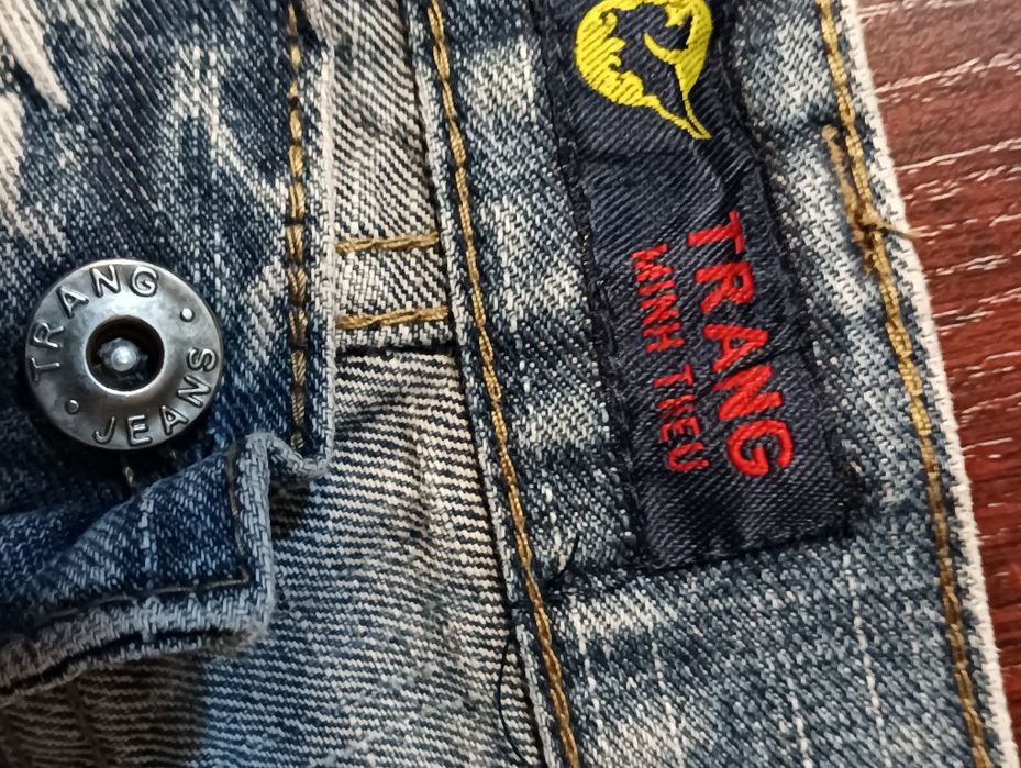 39* Spodnie męskie rozmiar 32 firmy Trang