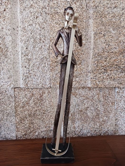 Figuras musicais em resina e metal