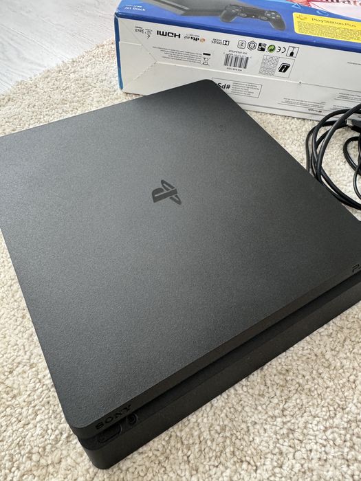 Playstation 4 com comando e caixa