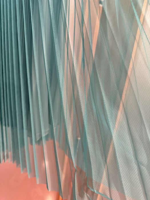 Saia plissada Imperial