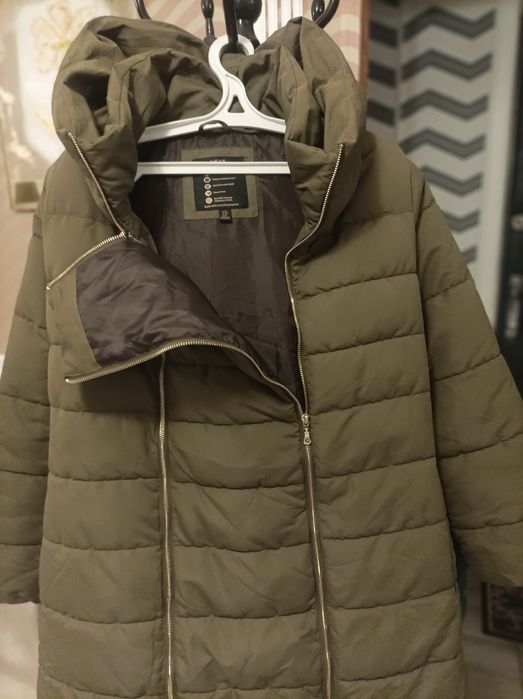 Продам новый пуховик Next р.52-54