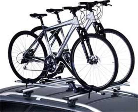 Barras de tejadilho Thule + suportes de bicicleta Nissan Qashqai 2014