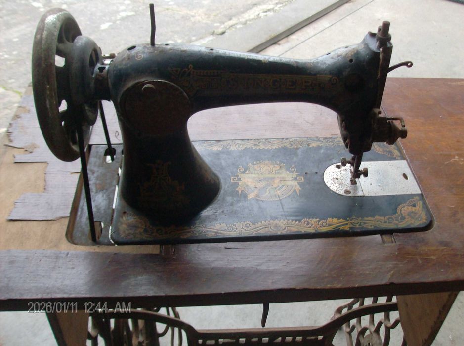 Maquina de Costura marca Singer
