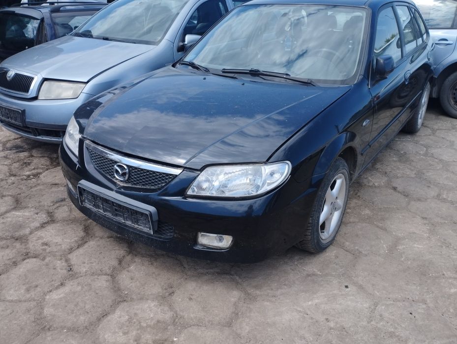 Mazda 323f lift zderzak przód tył klapa tylna maska czarne reflektor lampa