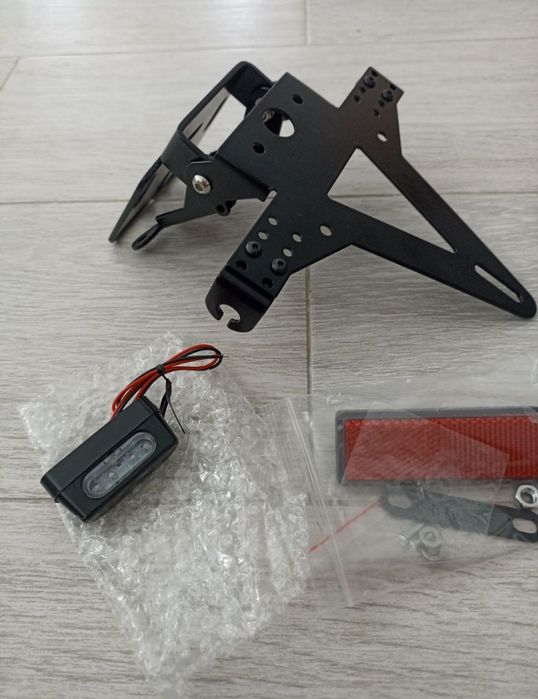 Кріплення номерного знаку