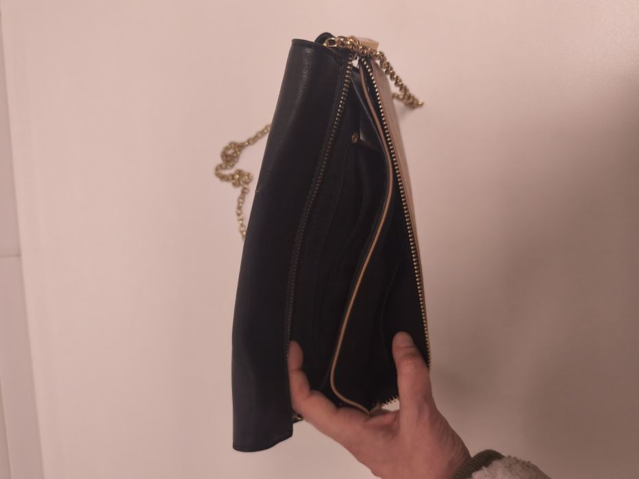 Mala tiracolo preta e bege