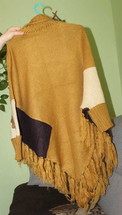 Ponczo damskie z frędzlami
Uniwersalny·Bardzo dobry