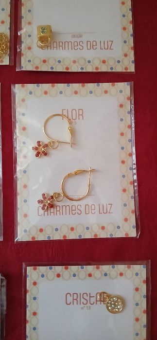 Medalhas Charmes de Luz, embaladas
