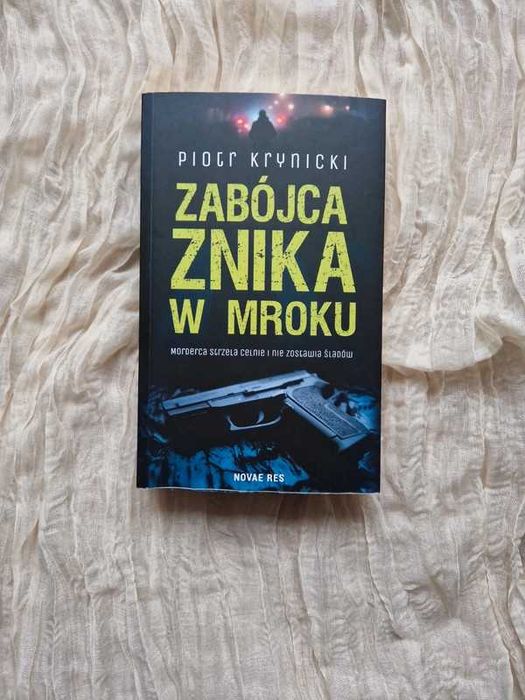 Zabójca znika w mroku P. Krynicki