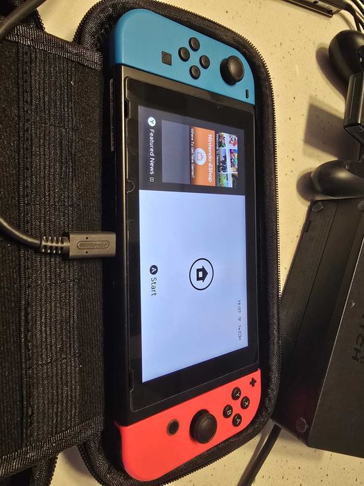 Konsola Nintendo Switch dodatki + 4gry