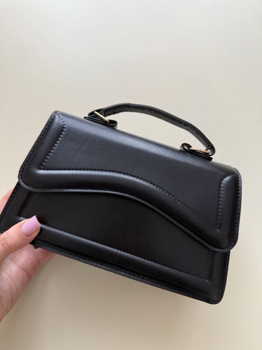 Сумка з регульованим ремінцем