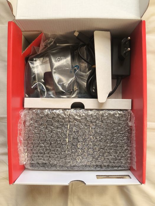 Nintendo Switch OLED + Extras