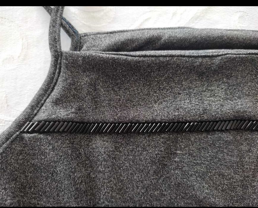 Top metalizado com pormenor de missangas