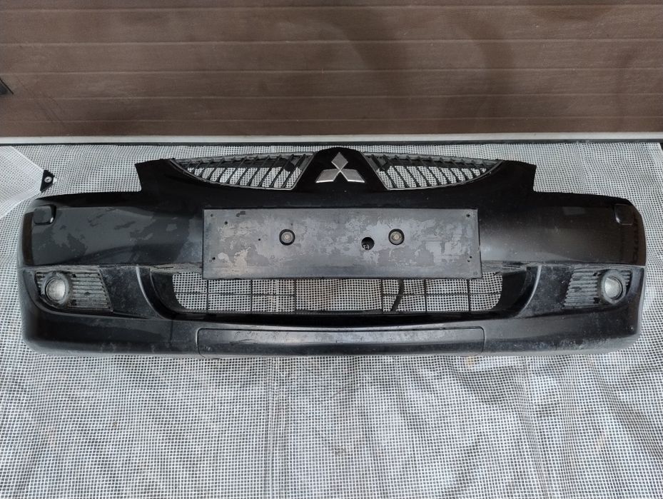 Mitsubishi Lancer 7 VII Sport spryski zderzak przód halogeny wysyłka