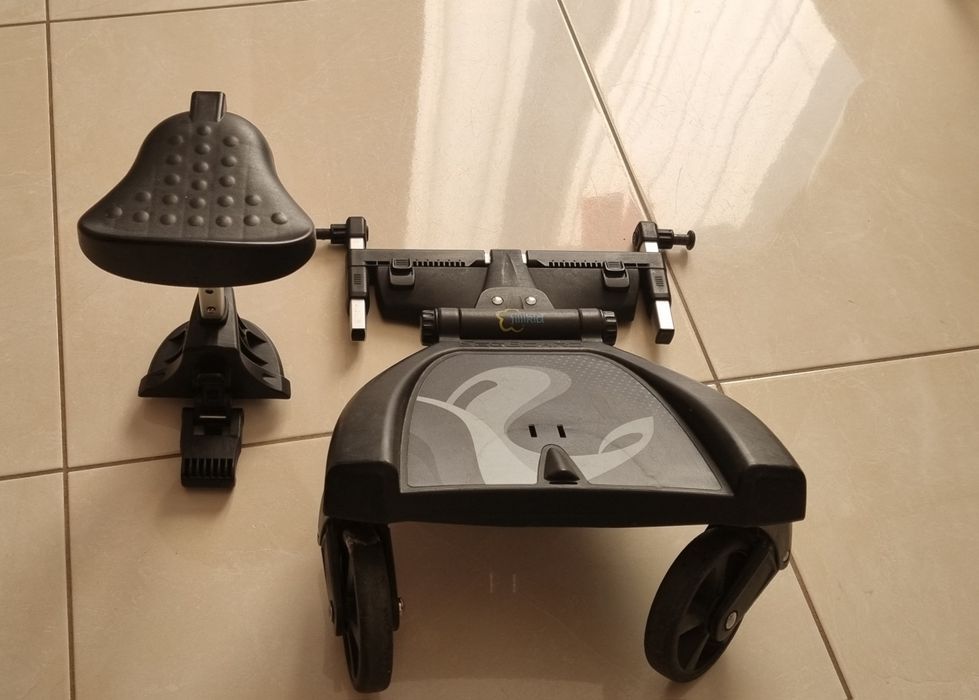 Dostawka do wozka z siedziskiem