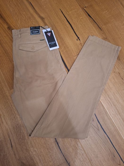 Guess, męskie spodnie chinosy, r. 30/32